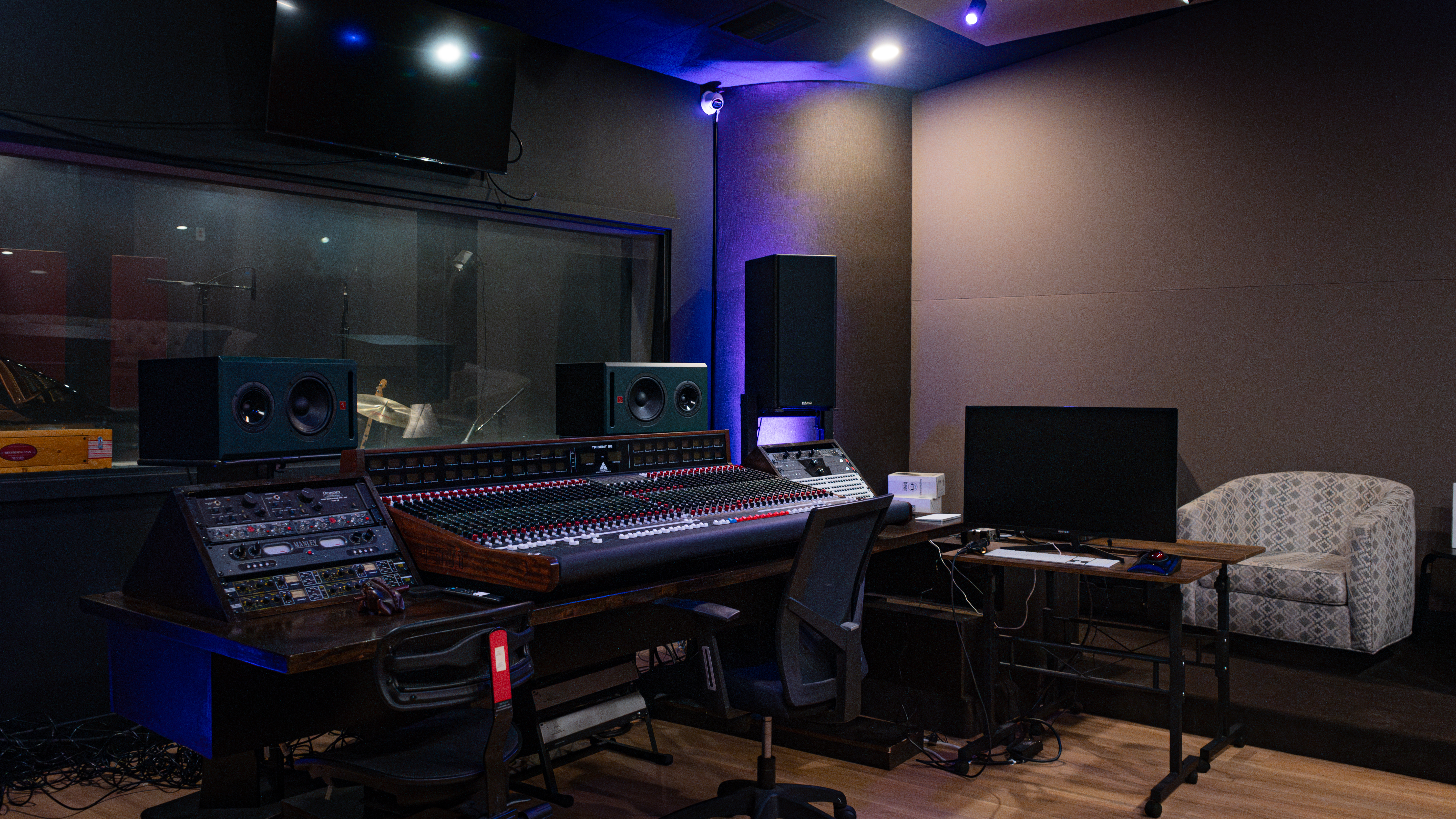 Professional mixing room with analog console